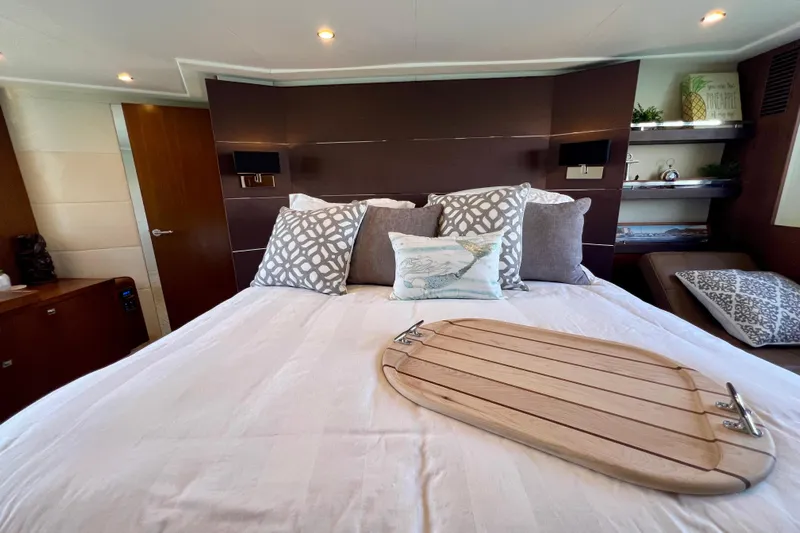  Yacht Photos Pics Luxurious bedroom interior of 2010 Princess V78 yacht with elegant bedding and decor.