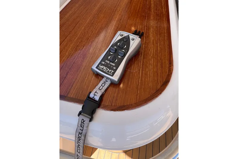  Yacht Photos Pics Remote yacht controller on wooden deck of 2010 Princess V78.