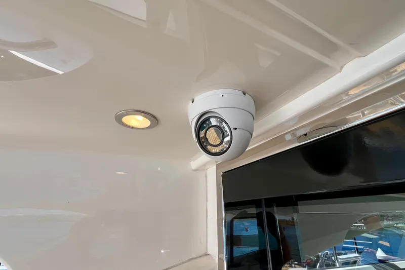  Yacht Photos Pics Security camera on 2010 Princess V78 yacht ceiling, near recessed light.