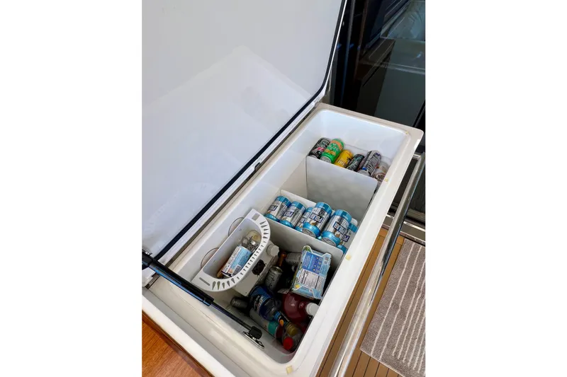  Yacht Photos Pics Open cooler on Princess V78 yacht, stocked with assorted beverages, 2010 model.