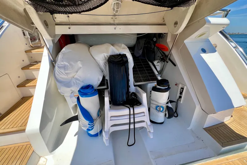  Yacht Photos Pics 2010 Princess V78 yacht storage area with equipment and supplies on deck.