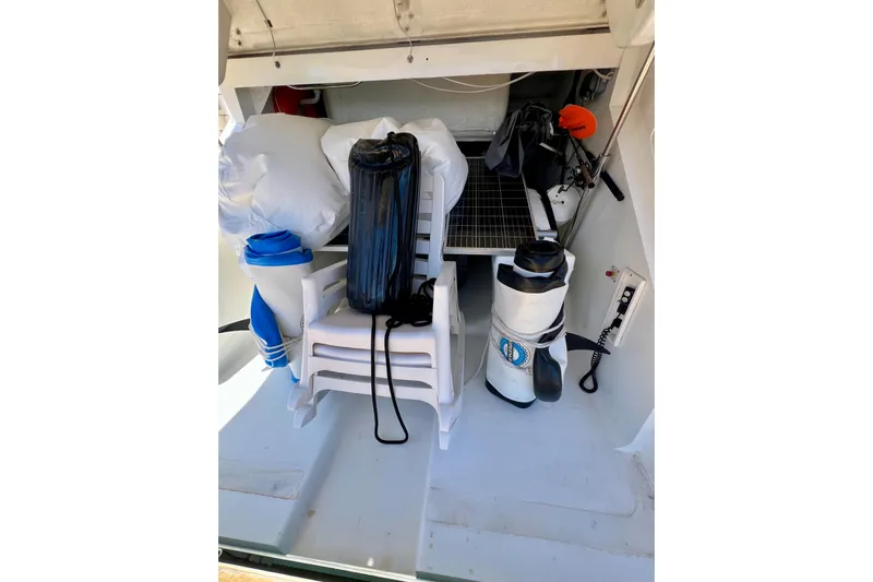  Yacht Photos Pics Storage area on a 2010 Princess V78 yacht with various equipment and supplies.