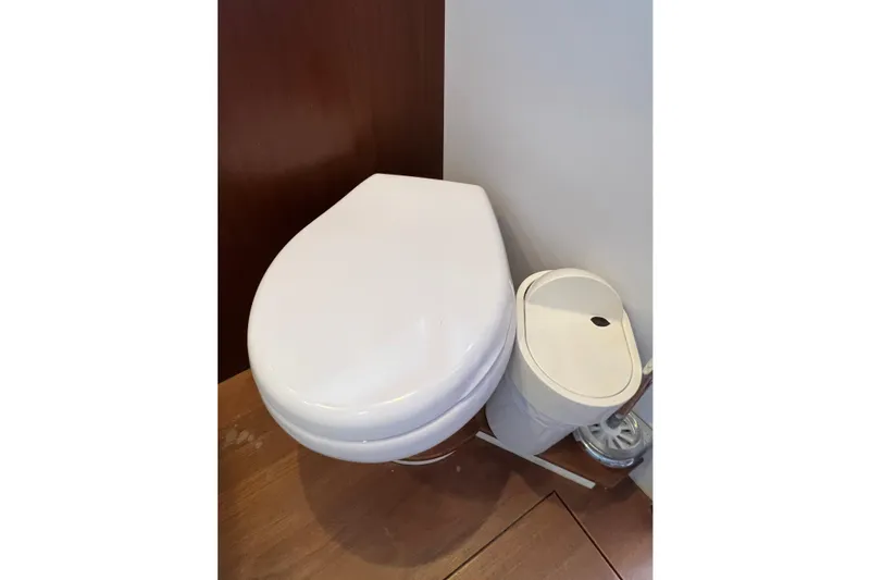  Yacht Photos Pics White toilet and bin in a Princess V78 yacht bathroom, 2010 model.
