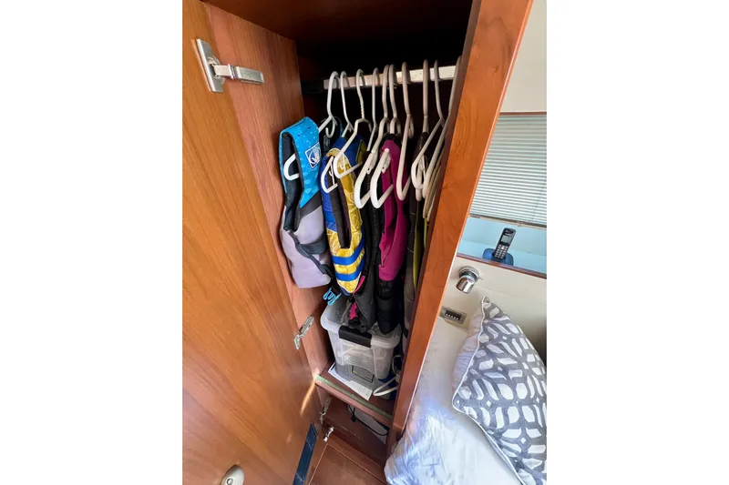  Yacht Photos Pics Closet on 2010 Princess V78 yacht with life jackets and storage.