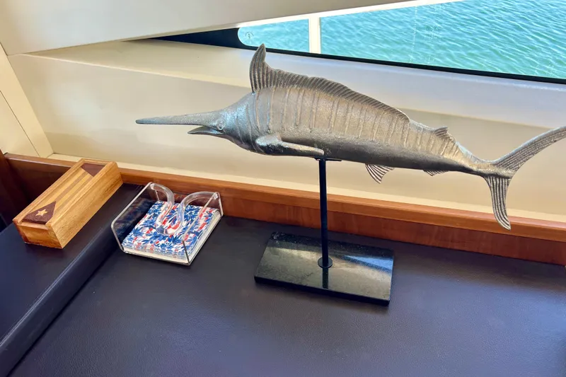  Yacht Photos Pics Decorative fish sculpture on Princess V78 yacht interior, 2010 model, with nautical-themed decor.