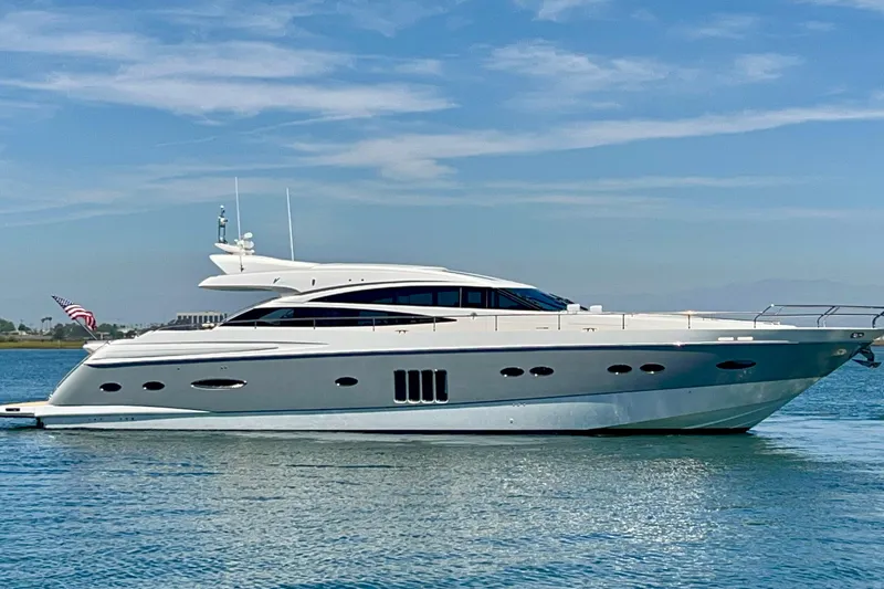  Yacht Photos Pics 2010 Princess V78 yacht cruising on calm blue waters under a clear sky.