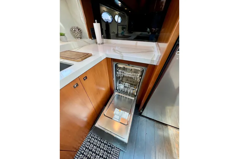  Yacht Photos Pics Modern kitchen in 2010 Princess V78 yacht with open dishwasher.