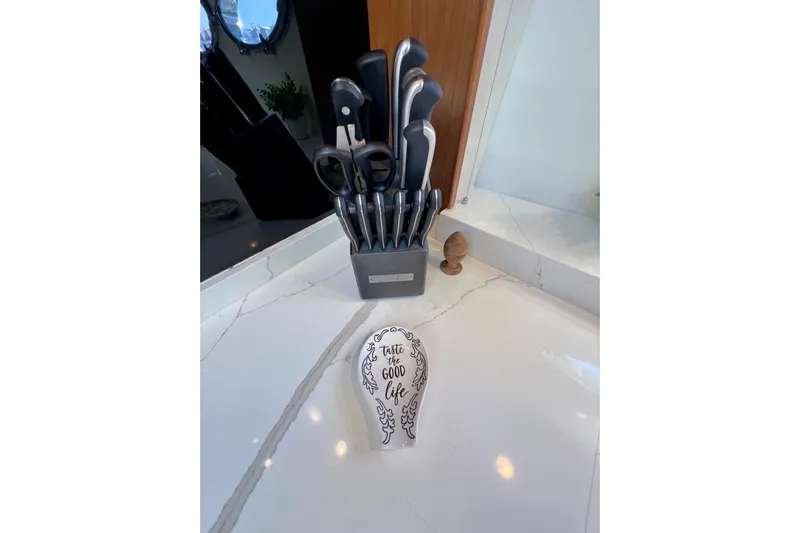  Yacht Photos Pics Knife set on marble counter in a 2010 Princess V78 yacht kitchen.