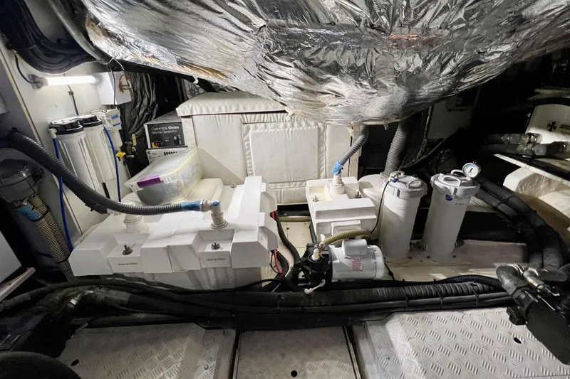  Yacht Photos Pics Engine room of 2010 Princess V78 yacht with mechanical equipment and insulation.