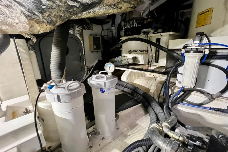  Yacht Photos Pics Engine room of 2010 Princess V78 yacht with filtration system and cables.