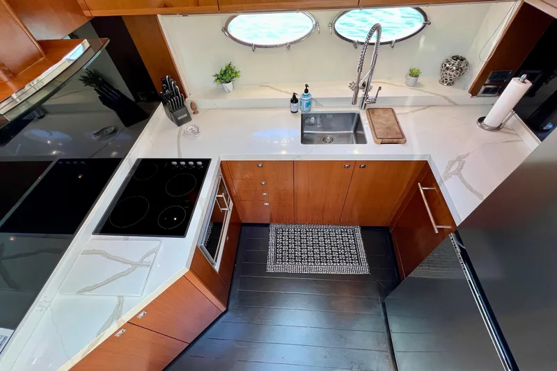  Yacht Photos Pics Modern kitchen in 2010 Princess V78 yacht with sleek countertops and appliances.