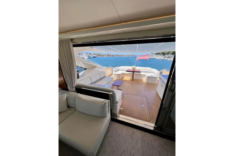  Yacht Photos Pics Luxurious 2010 Princess V78 yacht interior with ocean view and American flag.