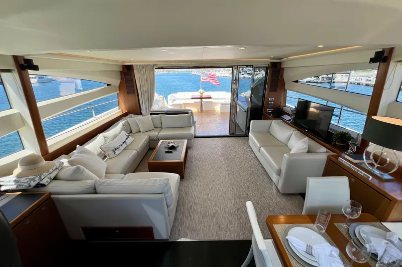 Yacht Photos Pics Luxurious interior of 2010 Princess V78 yacht with elegant seating and ocean view.