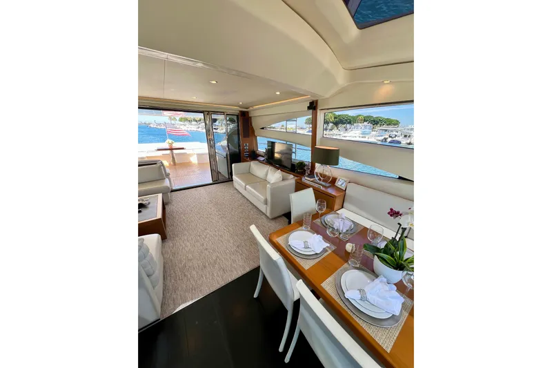  Yacht Photos Pics Luxurious interior of 2010 Princess V78 yacht with elegant dining and seating areas.