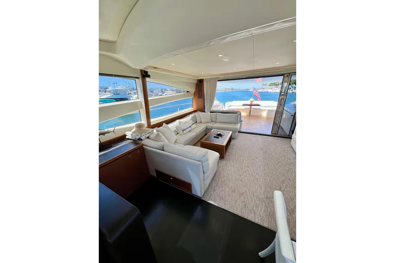  Yacht Photos Pics Luxurious interior of 2010 Princess V78 yacht with ocean view and elegant seating.
