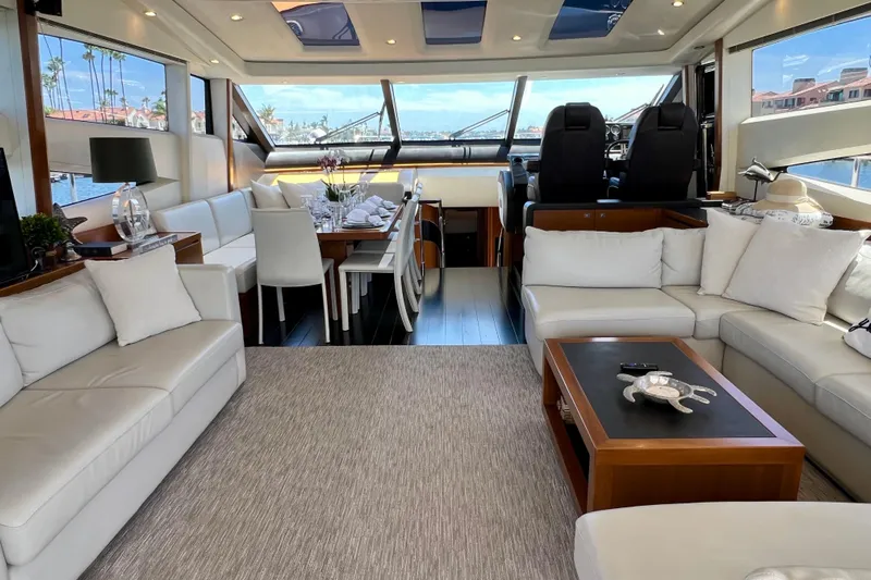  Yacht Photos Pics Luxurious interior of 2010 Princess V78 yacht with elegant seating and dining area.