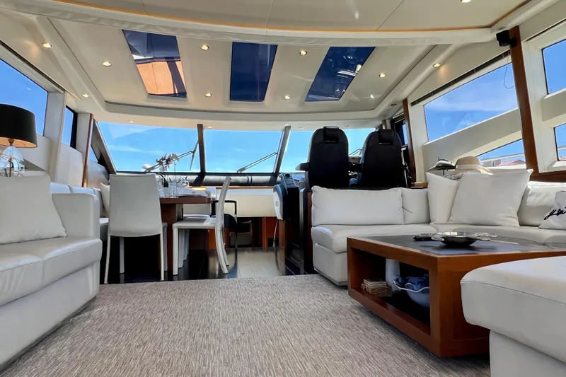  Yacht Photos Pics Luxurious interior of 2010 Princess V78 yacht with modern seating and dining area.