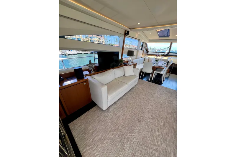  Yacht Photos Pics Luxurious interior of 2010 Princess V78 yacht with elegant seating and dining area.