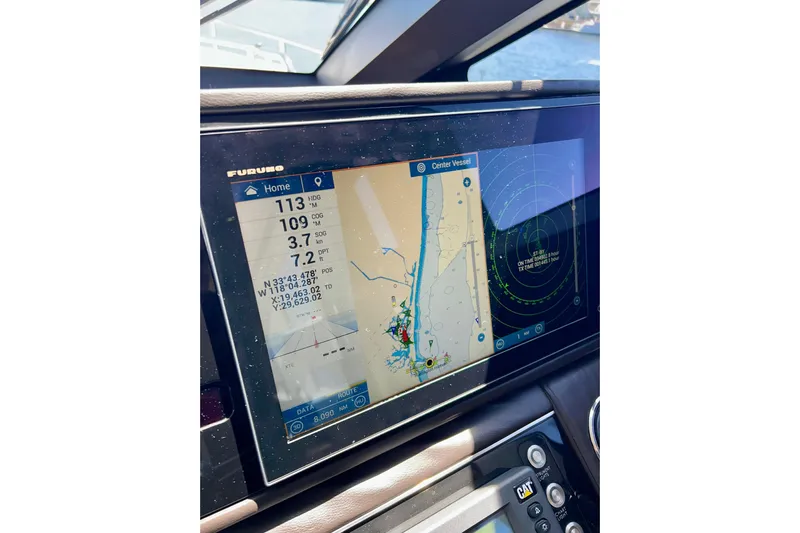  Yacht Photos Pics Navigation display on a 2010 Princess V78 yacht, showing route and radar data.