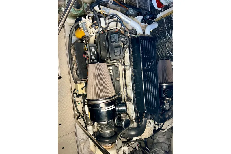  Yacht Photos Pics Engine compartment of a 2010 Princess V78 yacht, showcasing detailed mechanical components.