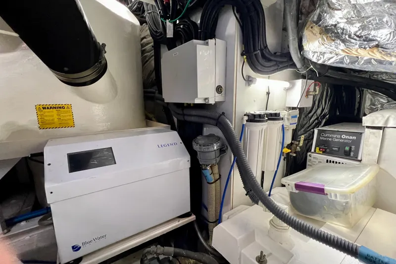  Yacht Photos Pics Engine room of 2010 Princess V78 yacht with Blue Water Legend and Cummins Onan generator.