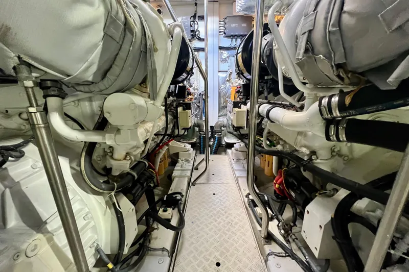 Yacht Photos Pics Engine room of 2010 Princess V78 yacht, showcasing machinery and components.