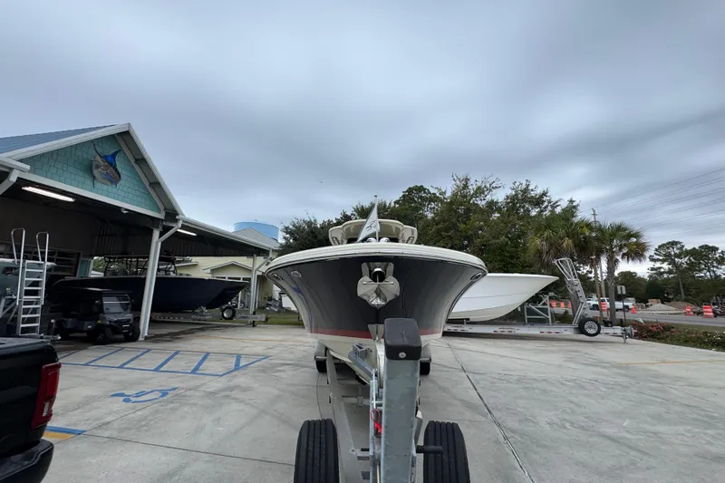  Yacht Photos Pics 2020 Chris-Craft Catalina 30 boat on trailer at a marina under cloudy skies.