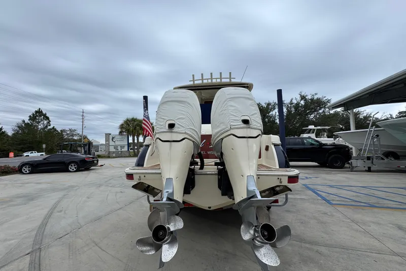  Yacht Photos Pics 2020 Chris-Craft Catalina 30 with dual outboard motors, parked in a marina.