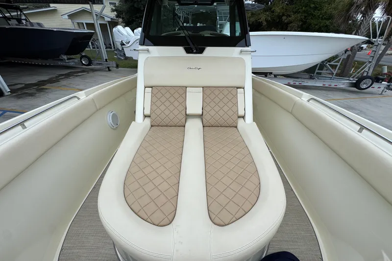  Yacht Photos Pics 2020 Chris-Craft Catalina 30 boat interior with beige quilted seating.