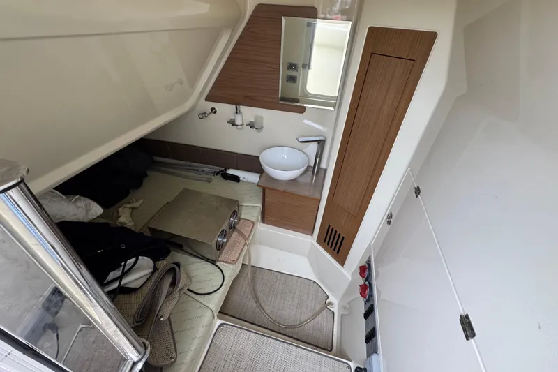  Yacht Photos Pics 2020 Chris-Craft Catalina 30 interior cabin with sink and storage.