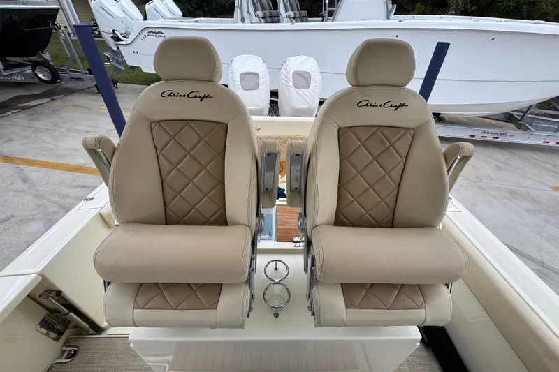  Yacht Photos Pics Luxurious seating on a 2020 Chris-Craft Catalina 30 boat, featuring elegant diamond-stitched upholstery.