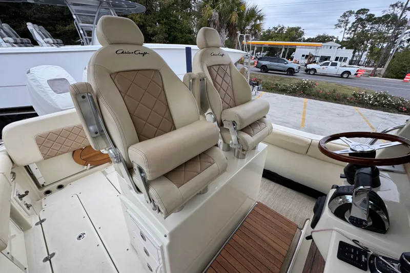  Yacht Photos Pics Luxury seating on 2020 Chris-Craft Catalina 30 boat, featuring elegant design and craftsmanship.