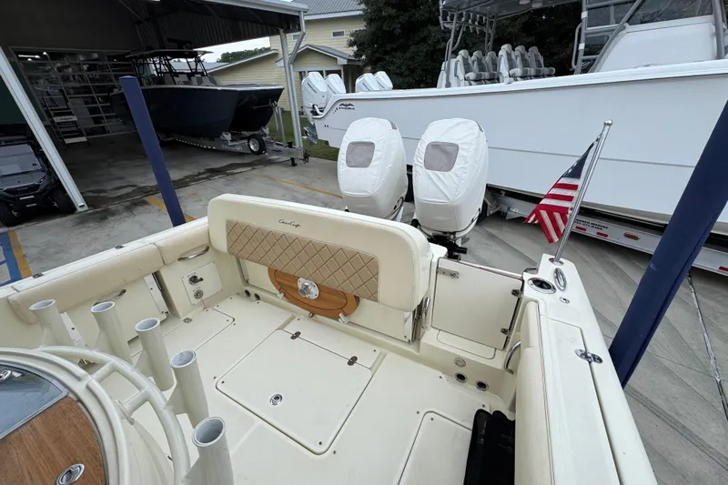  Yacht Photos Pics 2020 Chris-Craft Catalina 30 boat with dual engines and American flag in marina setting.