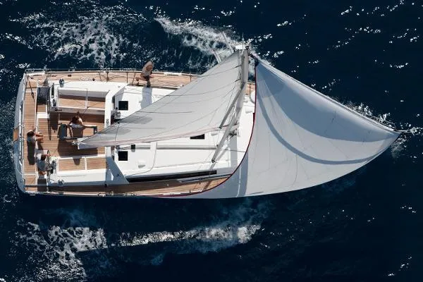 Secret Location Yacht Photos Pics 2014 Beneteau Oceanis 45 sailing yacht on open sea, aerial view.