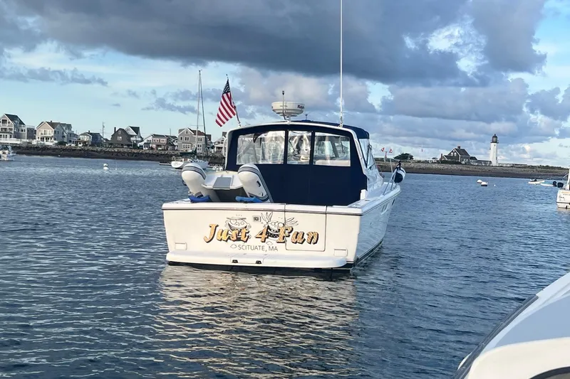  Yacht Photos Pics 2003 Tiara Yachts 3100 Open boat named "Just 4 Fun" in scenic harbor.