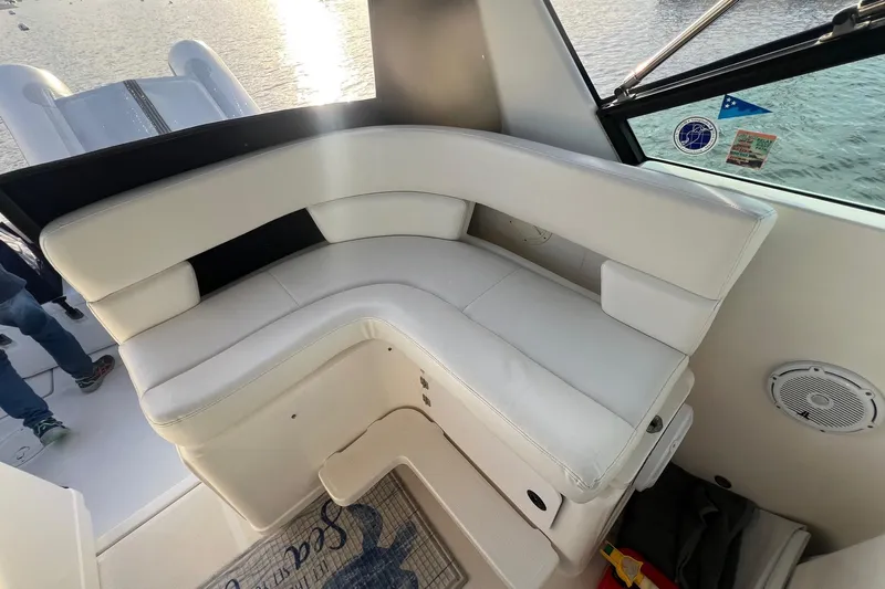  Yacht Photos Pics 2003 Tiara Yachts 3100 Open interior with white seating and window view.