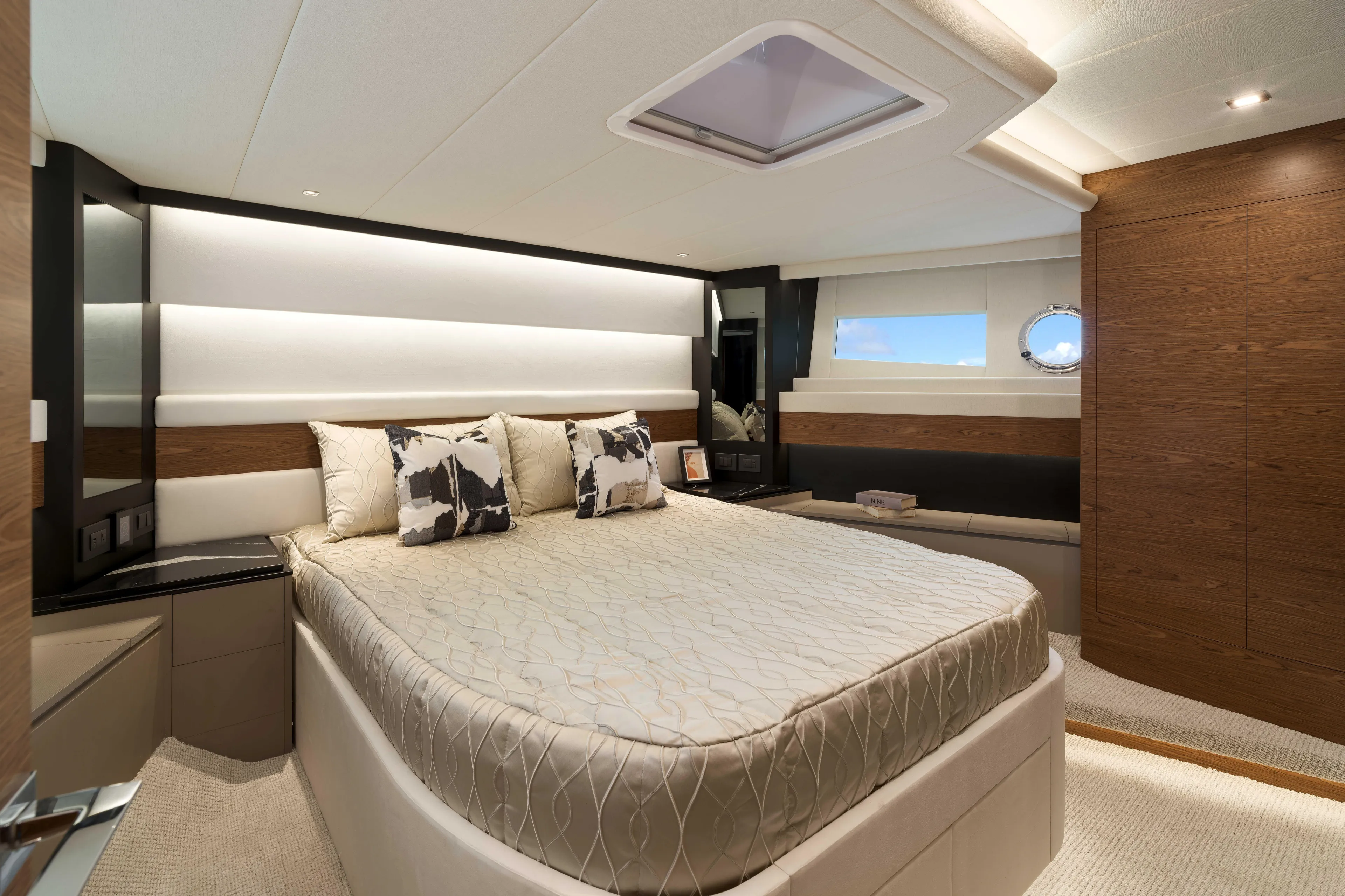 V77s-613 / Available Spring 2026 Yacht Photos Pics Luxurious bedroom interior of 2026 Horizon V77S yacht with elegant design and modern amenities.