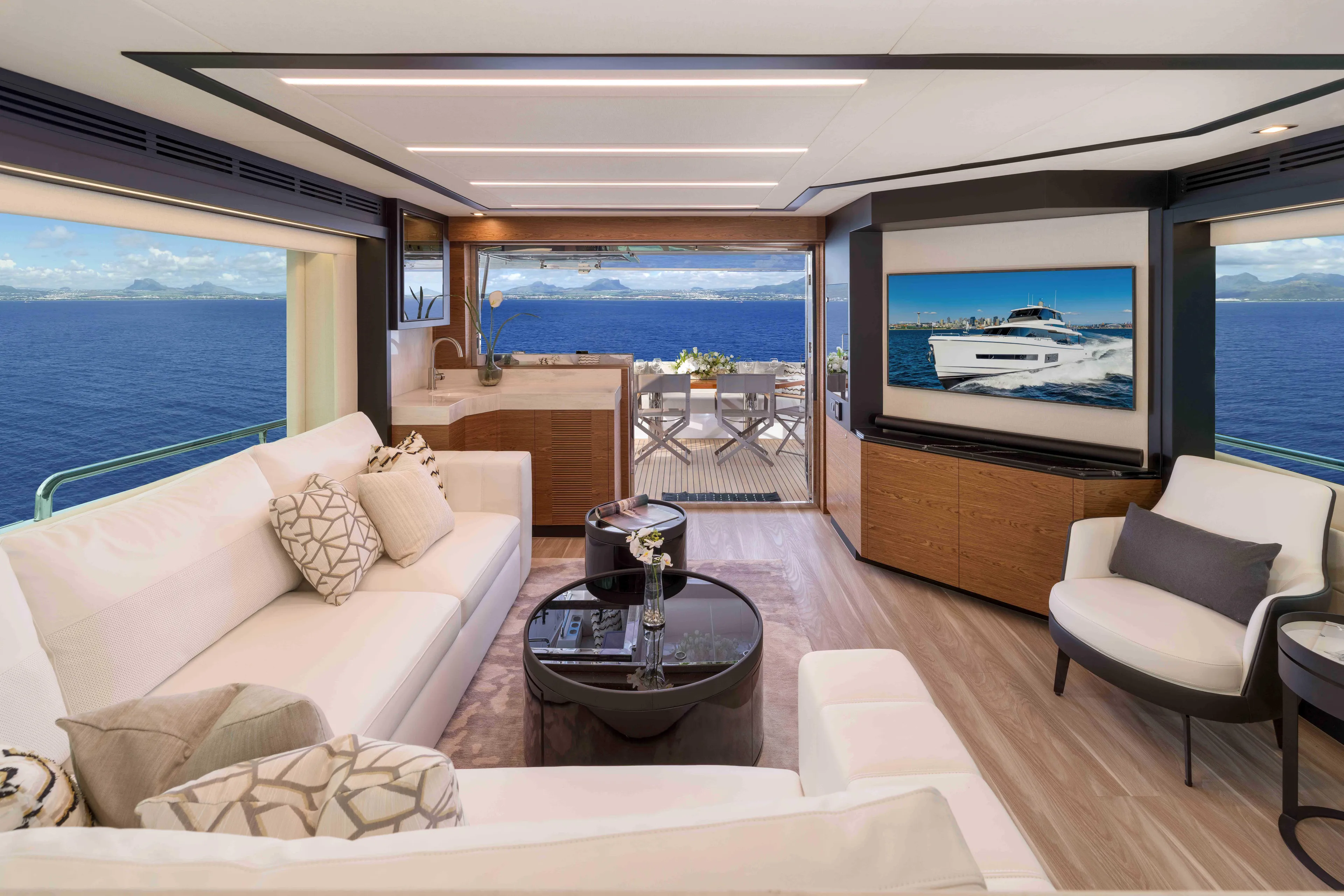 V77s-613 / Available Spring 2026 Yacht Photos Pics Luxurious Horizon V77S yacht interior with ocean view, modern decor, and elegant seating, 2026 model.