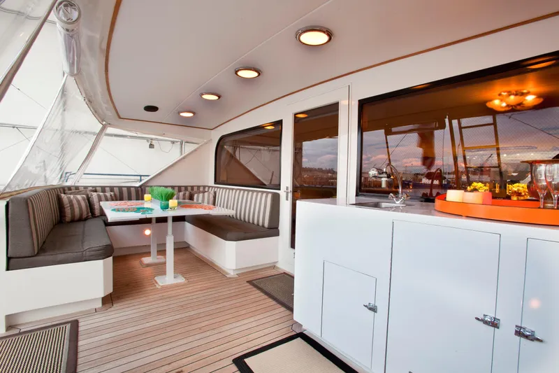 Golden Eagle Yacht Photos Pics Aft Deck Seating Area with dining table