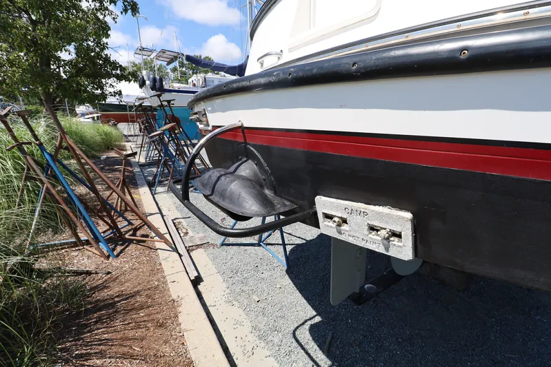 Edgin Yacht Photos Pics 2007 Nordic Tug 32 boat on dry dock, showing hull and propeller area.