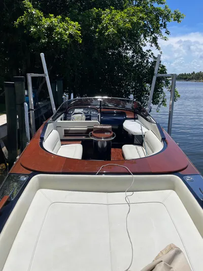 No Name Yacht Photos Pics 2016 Riva AQUAVIVA SUPER luxury boat docked by a scenic waterfront.