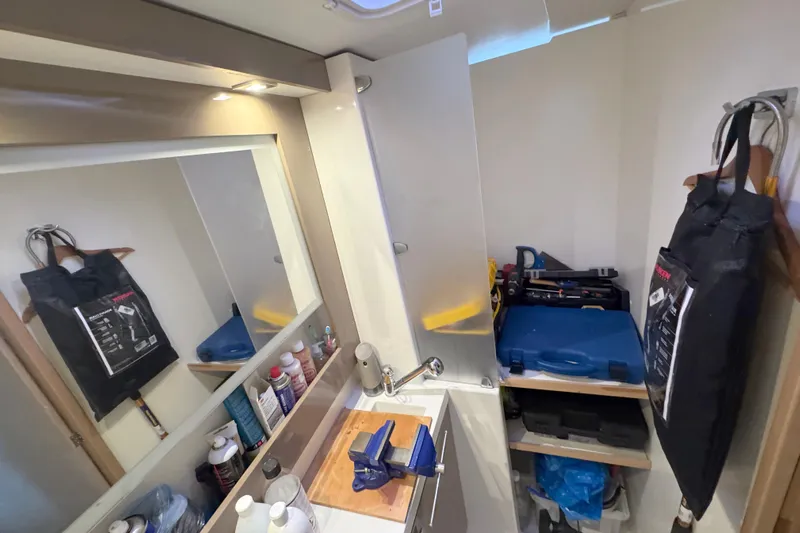Katla Yacht Photos Pics Interior of 2018 Fountaine Pajot Helia 44 Evolution with storage and tools.