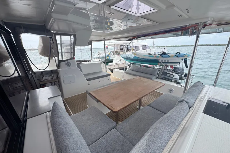 Katla Yacht Photos Pics 2018 Fountaine Pajot Helia 44 Evolution catamaran interior with spacious seating and ocean view.