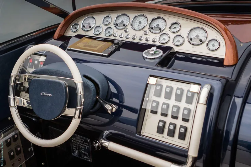 No Name Yacht Photos Pics Steering console of 2016 Riva AQUAVIVA SUPER yacht with gauges and controls.