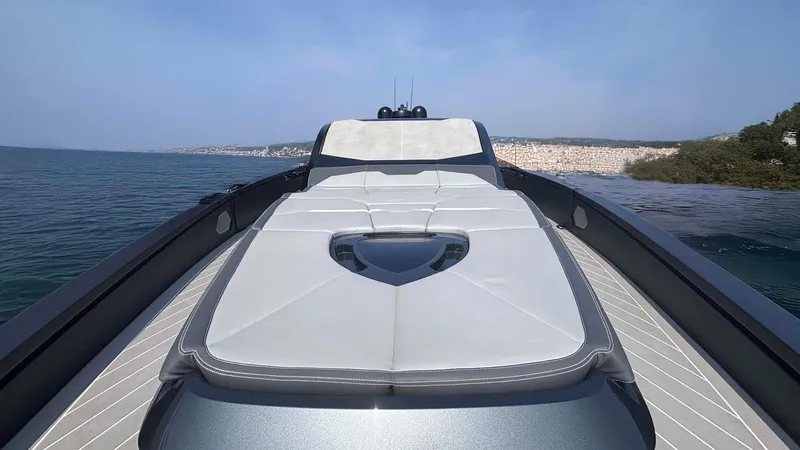 Yacht Photos Pics Luxury Tecnomar Lamborghini 63 yacht deck with sleek design, 2022 model, on calm waters.