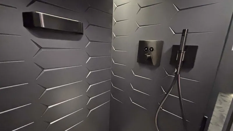  Yacht Photos Pics Luxurious black shower interior in 2022 Tecnomar Lamborghini 63 yacht.