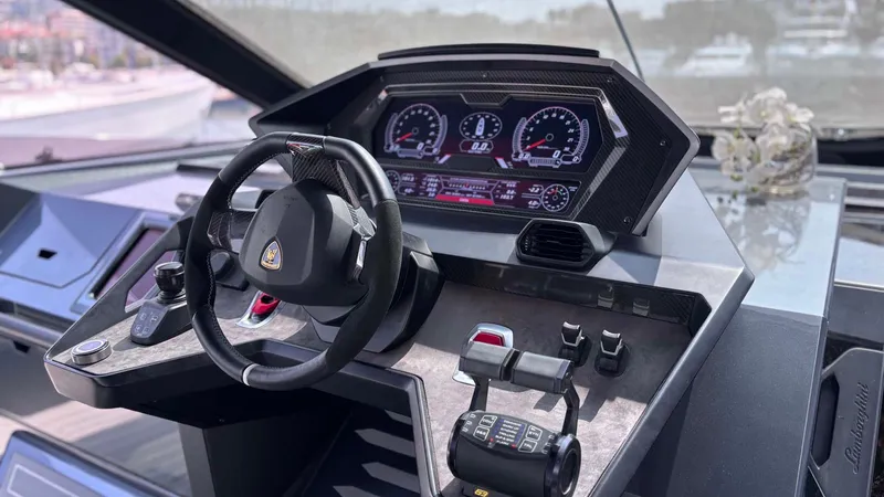  Yacht Photos Pics Cockpit of 2022 Tecnomar Lamborghini 63 yacht with sleek dashboard and advanced controls.