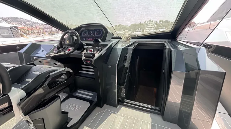 Yacht Photos Pics Interior of 2022 Tecnomar Lamborghini 63 yacht, featuring sleek design and advanced controls.