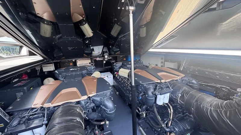  Yacht Photos Pics Engine room of 2022 Tecnomar Lamborghini 63 yacht, showcasing powerful dual engines.