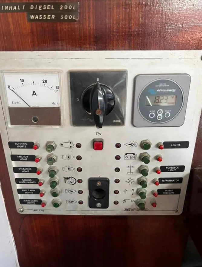 Control panel of a 1985 Gib'Sea 126 sailboat with various switches and gauges.